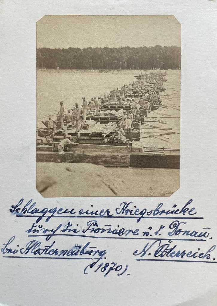 Unbekannter Fotograf, Klosterneuburg, 1870. "Schlaggen einer Kriegsbrücke durch die Pioniere ü. d. Donau bei Klosterneuburg N. Österreich. (1870)."